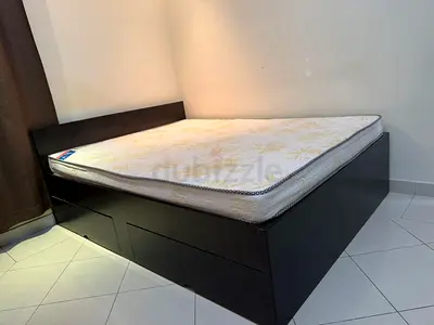 Queen size bed with Storage facility and Mattress.