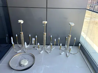 Modern multi-arm ceiling chandelier - set of 3 pendant lights, one multi beam led lamp.