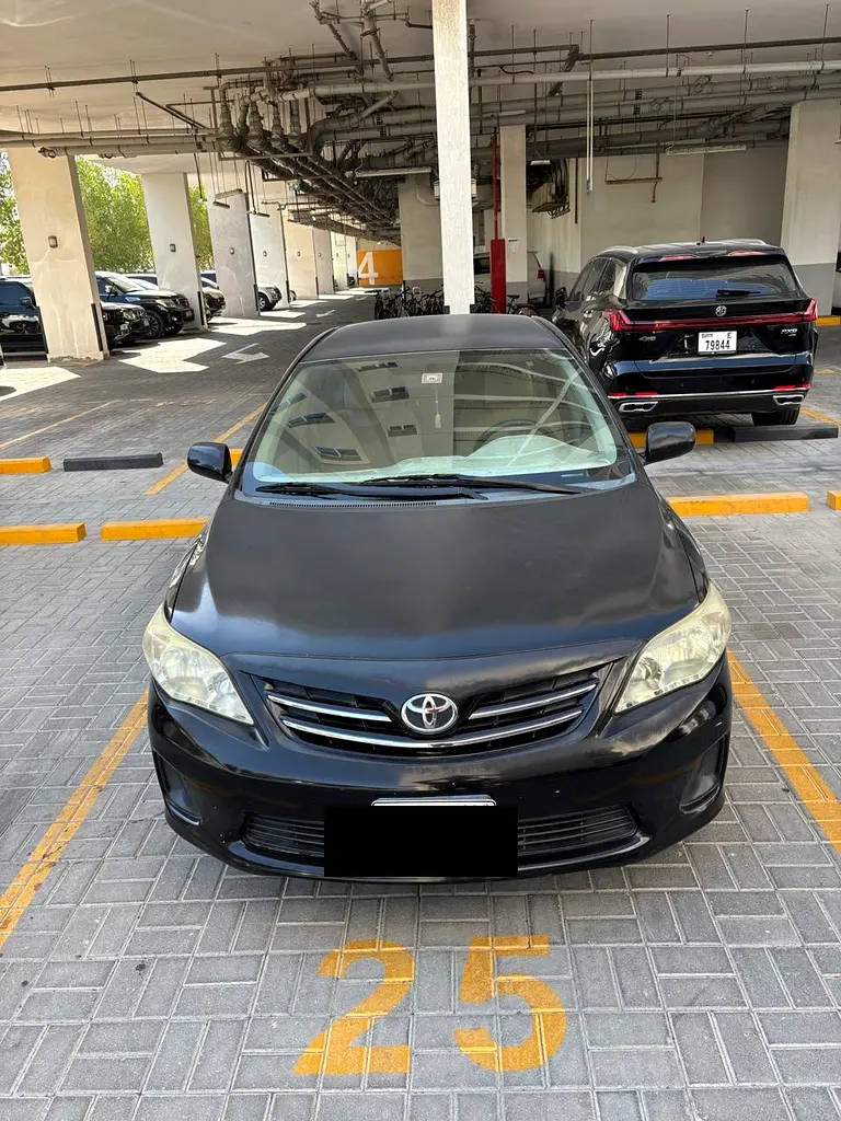Toyota Corolla 2013 — photo 1 of 7