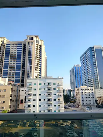 Balcony with a beautiful view - central air conditioning - the best opportunity for annual rent - a distinctive room and hall in Al Rashidiya 3, Ajman