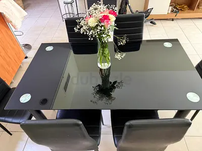 Black Glass Dining Table with 4 Black Chairs - Good Condition