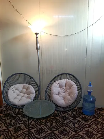 Garden tabel chairs for sale urgent good condition only 150 AED with free lamp