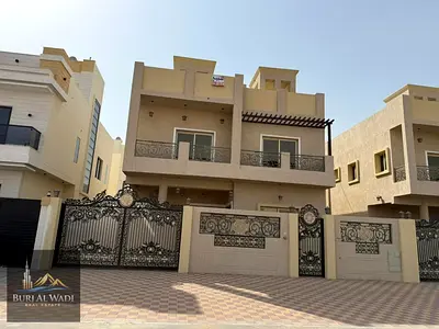 Villa for sale in Ajman, Al Helio 2, with a modern and elegant design and spacious area.