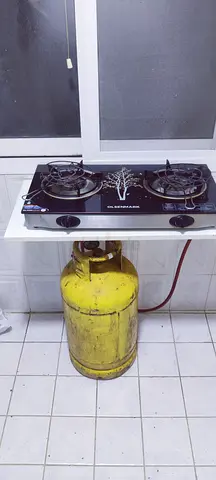 Two-burner gas stove with LPG cylinder - good working condition