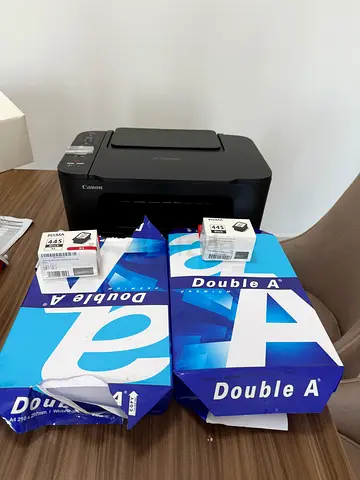 Canon Pixma Compact Home Printer with Extra Ink Cartridges and paper