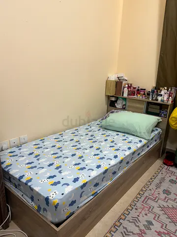 Single bed with mattress and storage