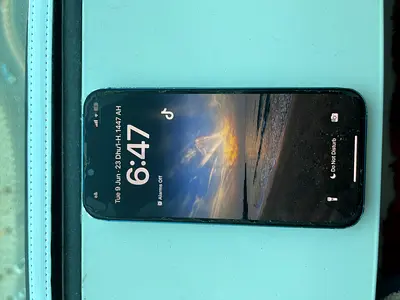 Used iPhone with case — good working condition