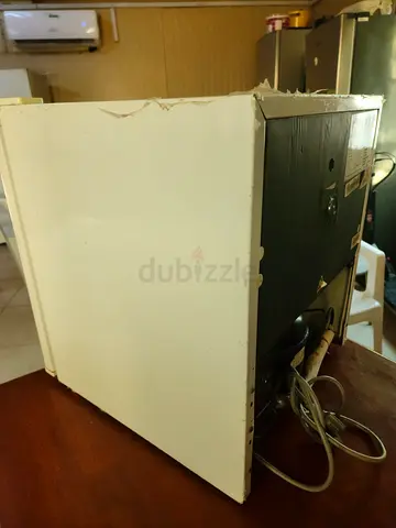 Used Countertop Microwave Oven - Functional, visible wear on exterior