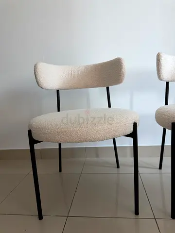 2 dining chairs white whool and black legs