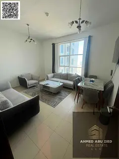 Furnished 2BR apartment with balcony and private parking for annual rent in City Tower Ajman, opposi
