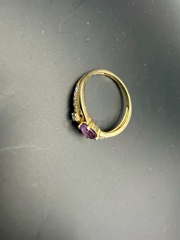 18k Gold ring with natural purple stone and side diamonds, size 54