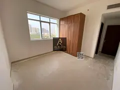 For annual rent in Ajman, in Princess Village: two bedrooms, a living room, two bathrooms, and built