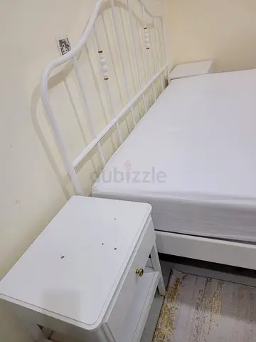 King size bed with side tables and carpets for sale