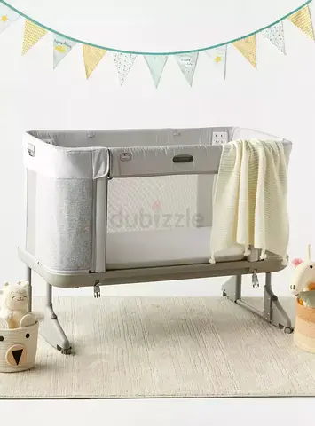 Light grey bedside bassinet / co-sleeper in good condition