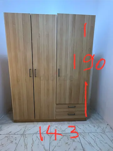Ikea-style 3-door wooden wardrobe with drawers - 190cm height, good condition