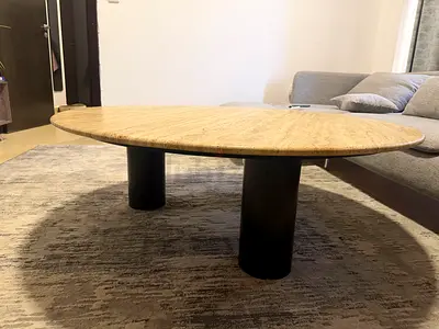 Round Low Stone Coffee Table with Black Cylinder Legs