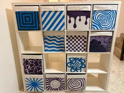 White 16-Cube Storage Shelf with 12 Decorative Fabric Bins