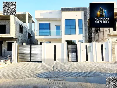 Villa for sale in Ajman, including registration fees (5 master bedrooms + large majlis with washrooms + large hall + maid's room + equi