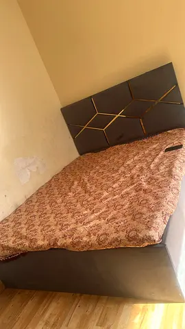 King size bed frame with mattress with decorative headboard - good condition