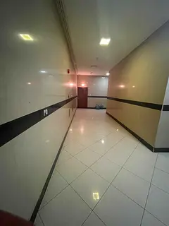 Elegant 2-bedroom apartment for annual rent in Al Taawun with 3 bathrooms and central AC, close to a