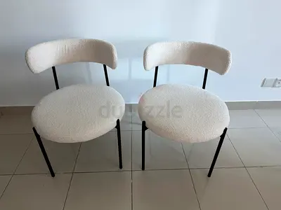 2 dining chairs white whool and black legs