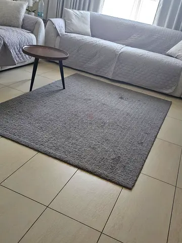 Gray textured living room rug - good used condition