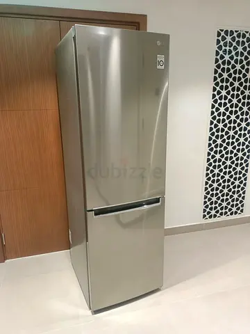 LG stainless steel refrigerator, bottom freezer - excellent condition