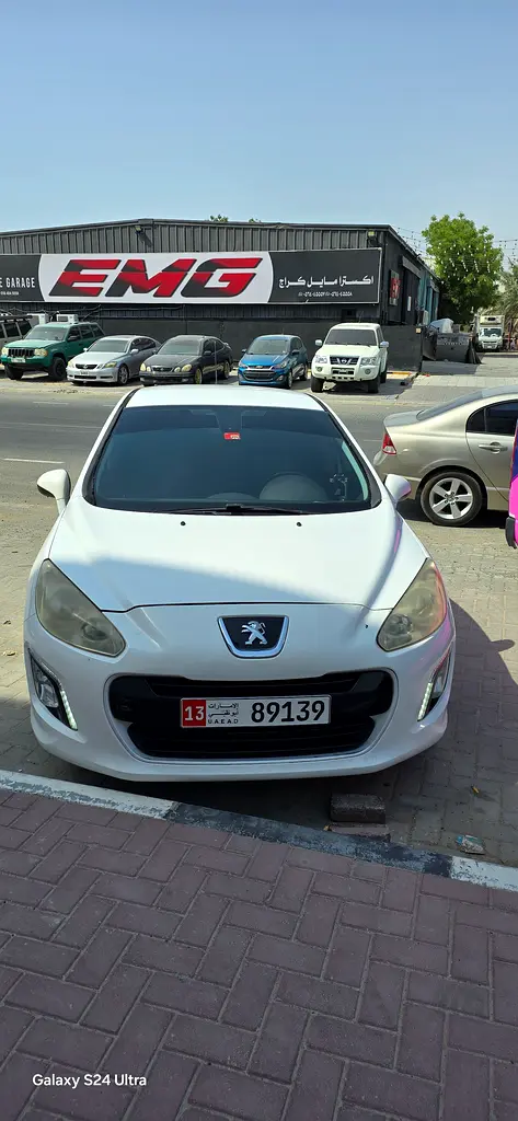 Peugeot 308 2013 — photo 1 of 6