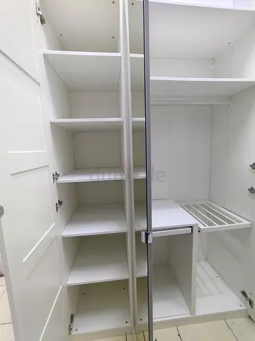White Built-in Wardrobe / Closet Units with Shelves and Pull-out Rack