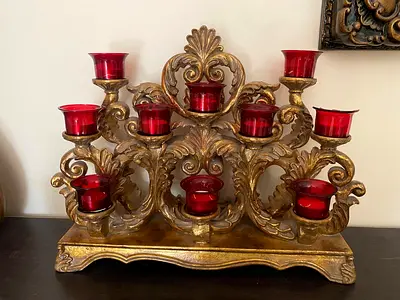 Living room decorations. Candles stand, pots