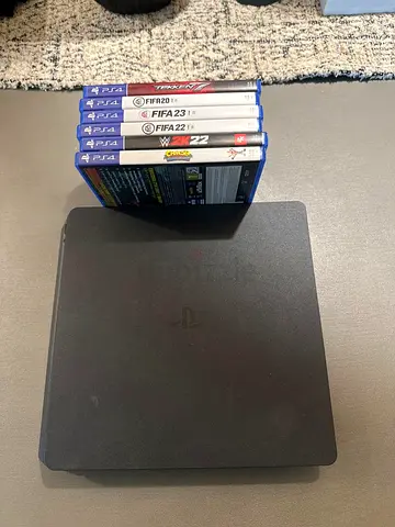 1TB PS4 Slim with 7 Games (FIFA 20/21/22/23, Tekken, NBA 2K22, Crash)