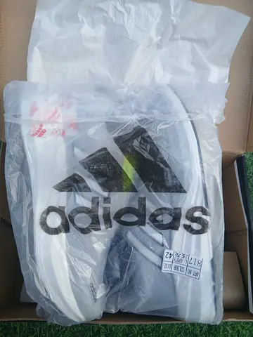 Adidas running shoes - size 42, new in box