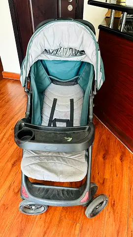 Used single stroller with tray and canopy - good condition