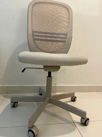 Light grey ergonomic office chair with mesh back — good condition