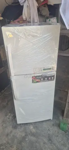 White Double-Door Refrigerator in Good Working Condition like new