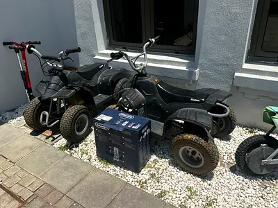 Two kids electric ride-on ATVs (battery-powered) - used