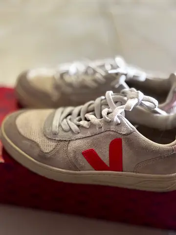 Light grey Veja sneakers with red V logo, size 36
