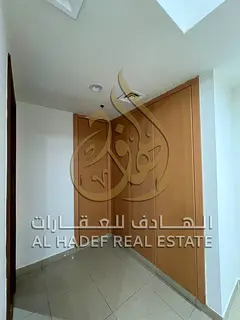 Annual Rent in Sharjah – Al Majaz 3 A two-bedroom apartment with a living room in a prime location