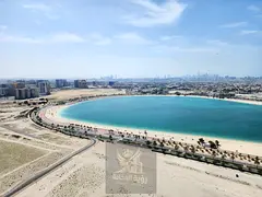 The most amazing bedroom and living room with a balcony offering a full sea view in Al Mamzar. The m