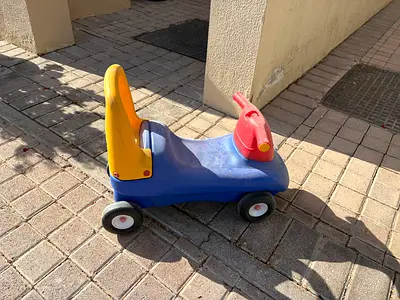 Free: little plastic ride-on car toy — sturdy and used