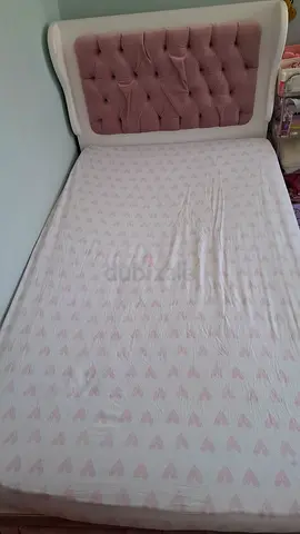 Single/Small Double bed with tufted pink headboard and mattress