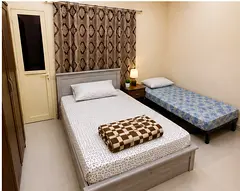 Executive bed space in big studio apartment