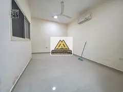 Studio Al Rawda 2 Ajman split AC semi-open kitchen 18K yearly 4 payments prime location close to ser
