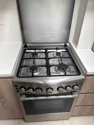 Stainless Steel 4-Burner Gas Cooker with Oven - Good Condition