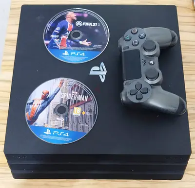 PS4 PRO 1 TB 1 CONTROLLER 2 GAMES