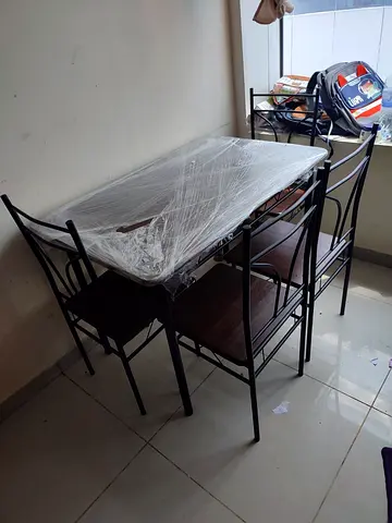 Compact 4-Seater Dining Table with Metal Frame and Wooden Seats - Good Condition