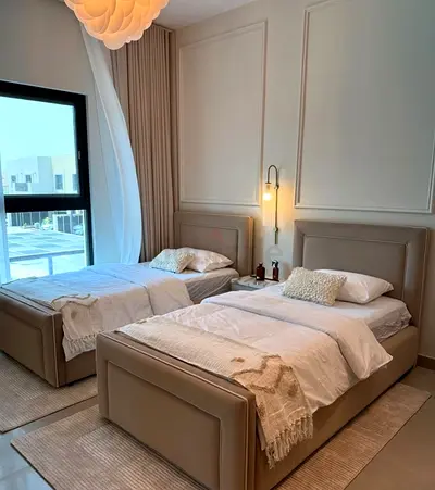 Pair of Beige Twin Leather Beds with Headboards -