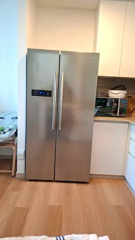 Midea refrigerator latest model side by side neat and clean good condition