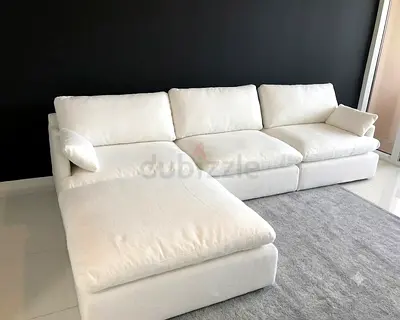 Almost new condition home center feather 🪶 filled modular 4 piece sofa with ottoman