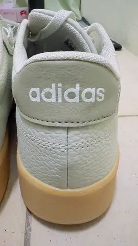 Used adidas white casual sneakers, clean condition